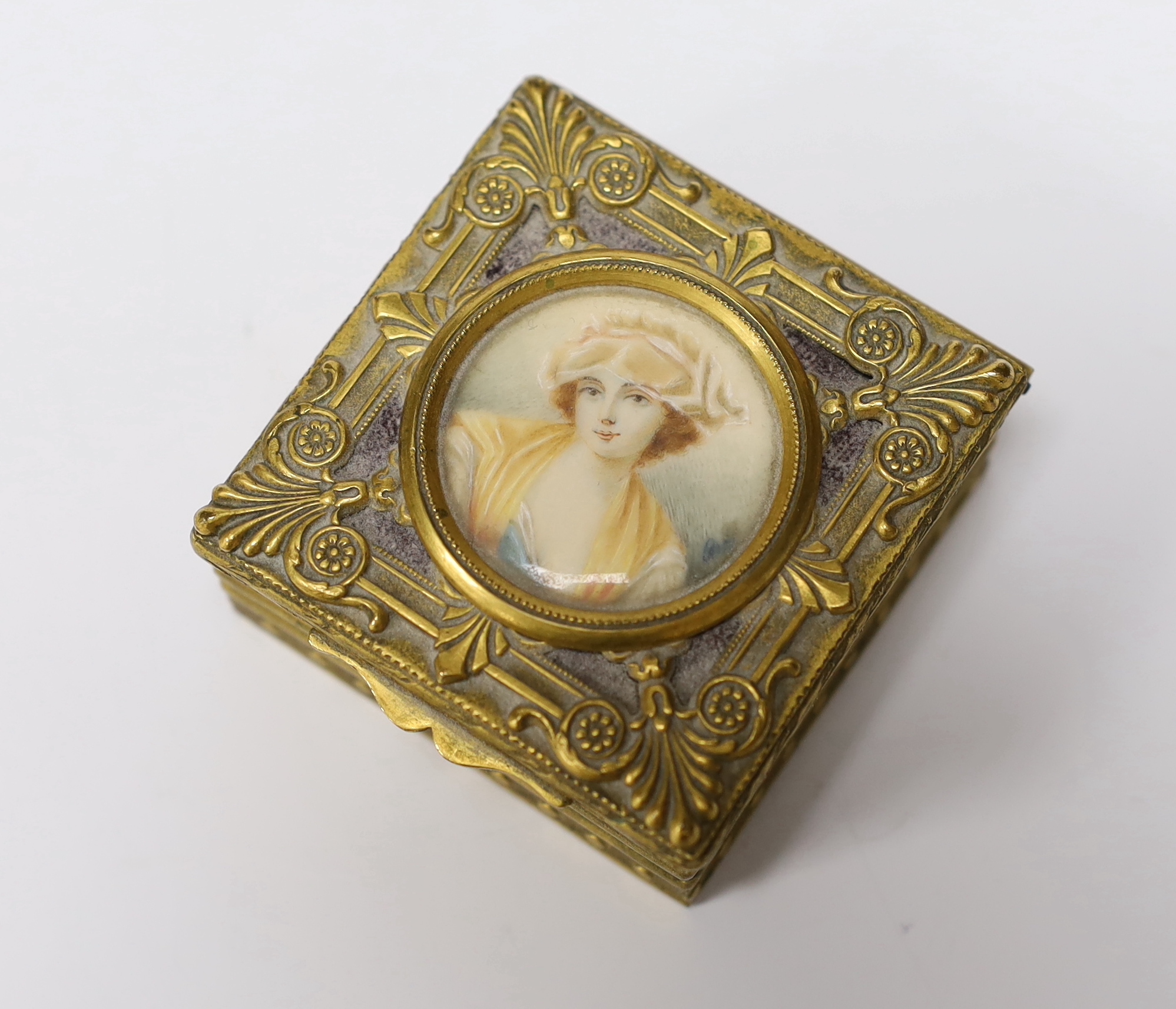 Two boxes comprising agate and a gilt metal example with inset portrait of a lady together with a cased DuPont lighter